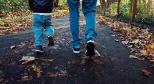 dad and kid walking