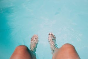 Sitting in swimming pool