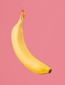 Banana with a pink background