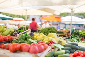 farmers market display of various vegetables