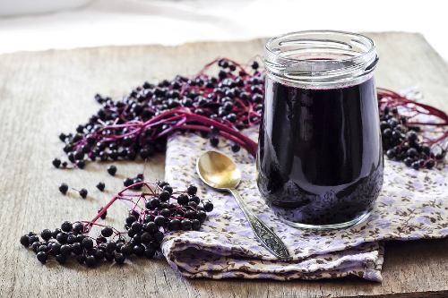 elderberry syrup jar with spoon