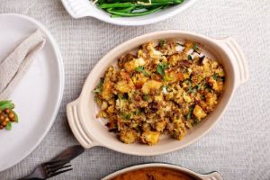 holiday stuffing in a white casserole dish