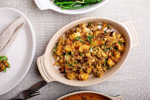 holiday stuffing in a white casserole dish 