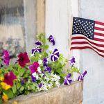 American flag in flower box