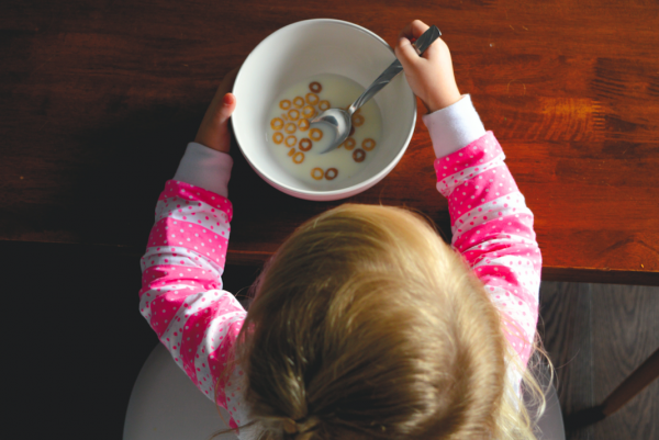 girl eating cereal