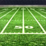 football field showing the 50 yard line
