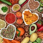 brightly colored food in heart shaped bowls