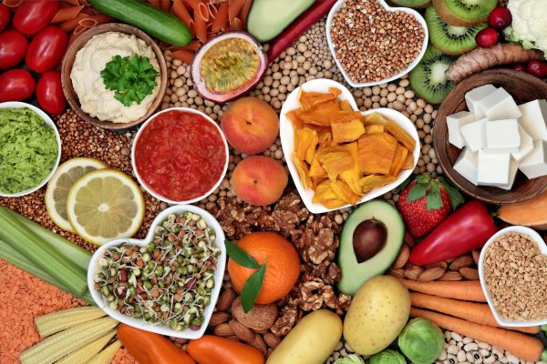 brightly colored food in heart shaped bowls