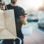 food delivery bag being handed to you