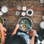 group of kids preparing food