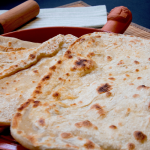 flatbread on board with rolling pin