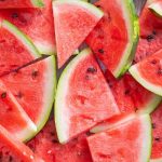 slices of watermelon arranged in a random pattern