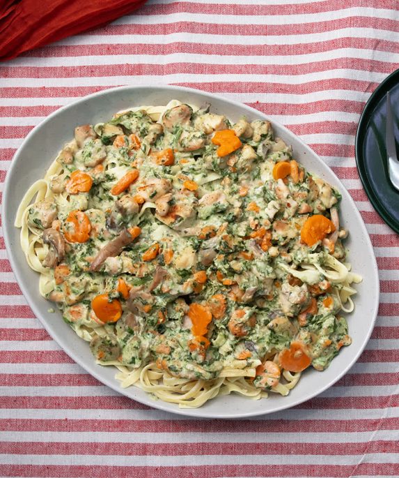 bowl of pasta next to utensils